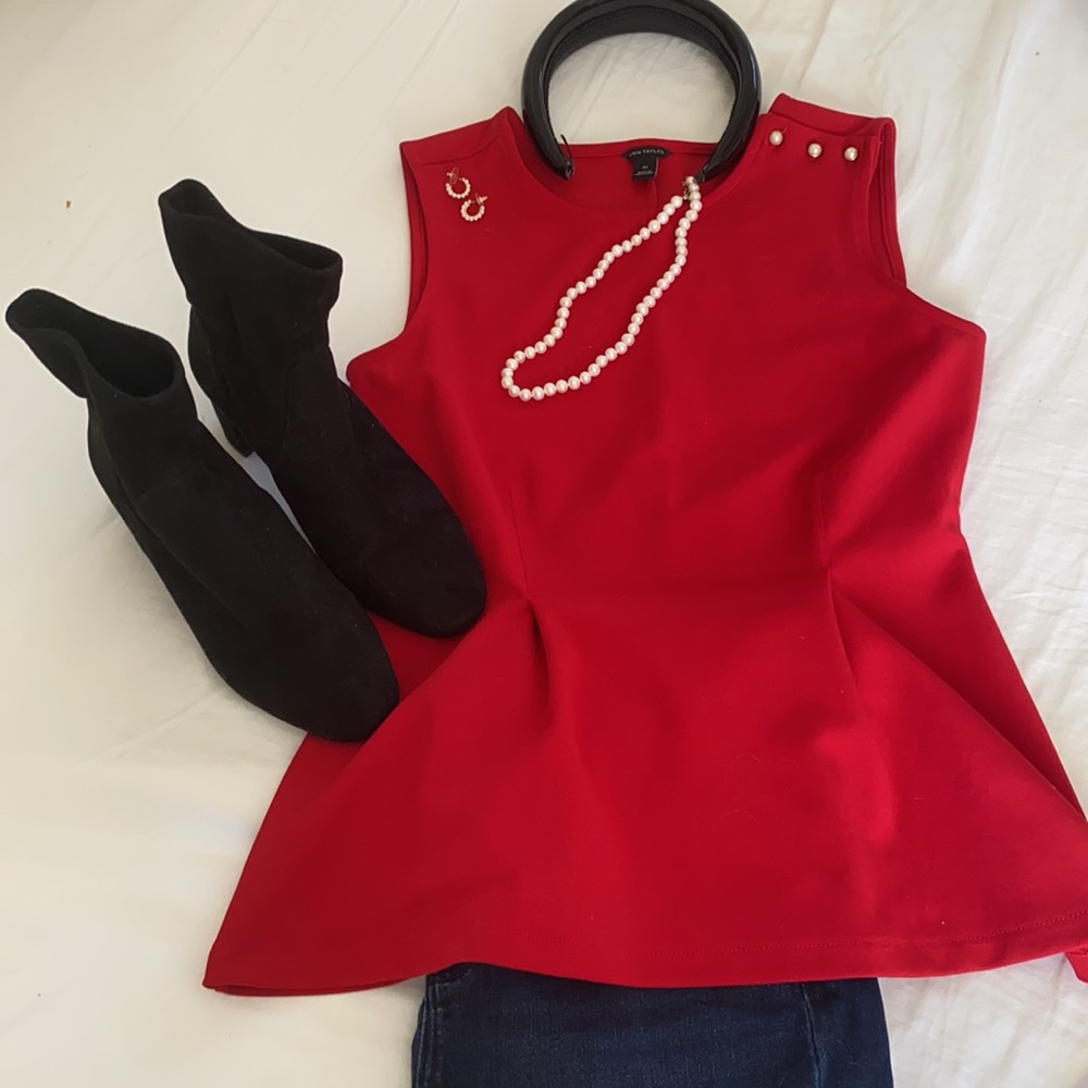 Peplum pearl detailed top